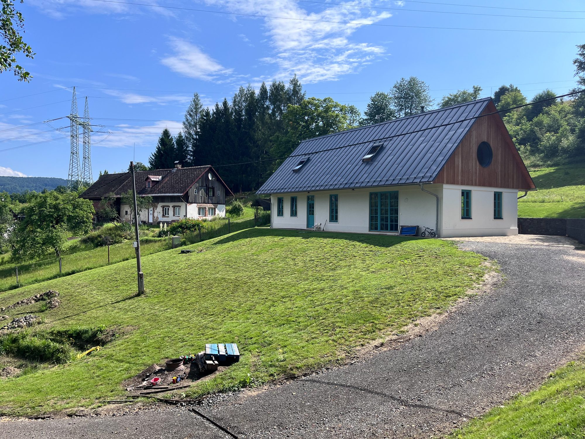 from the road, the old neighbour behind